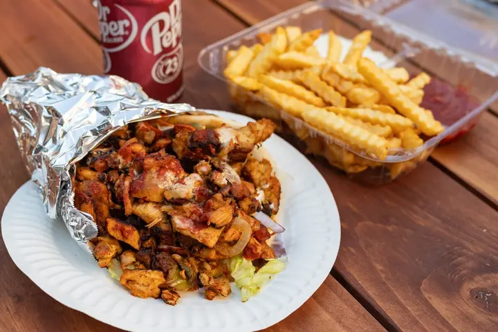 Chicken gyro meal with fries and a drink