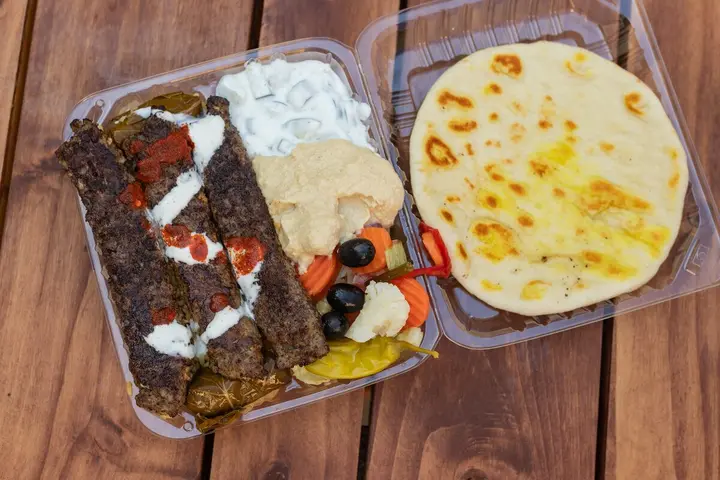 Kofta over rice with pita